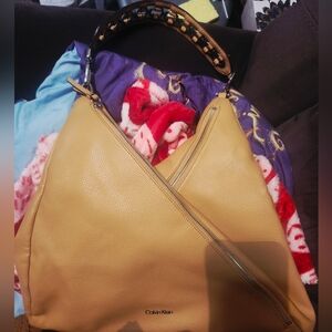 Calvin Klein Beige Hobo Bag with Patterned Handle